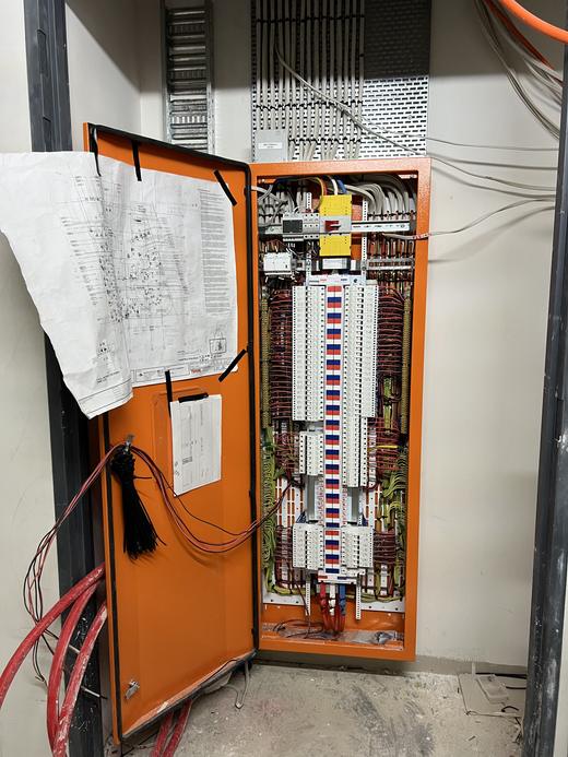 Commercial distribution board with site drawings on the door