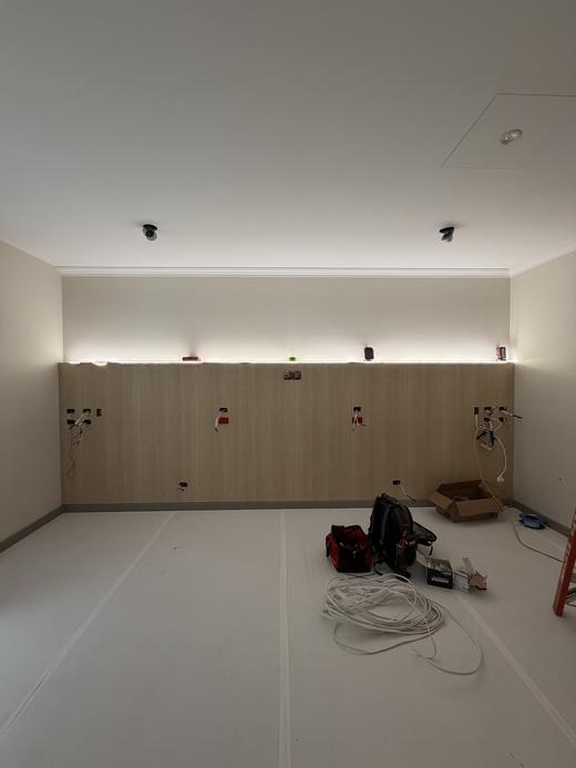 Fitted joinery with concealed LED strip lighting and downlights