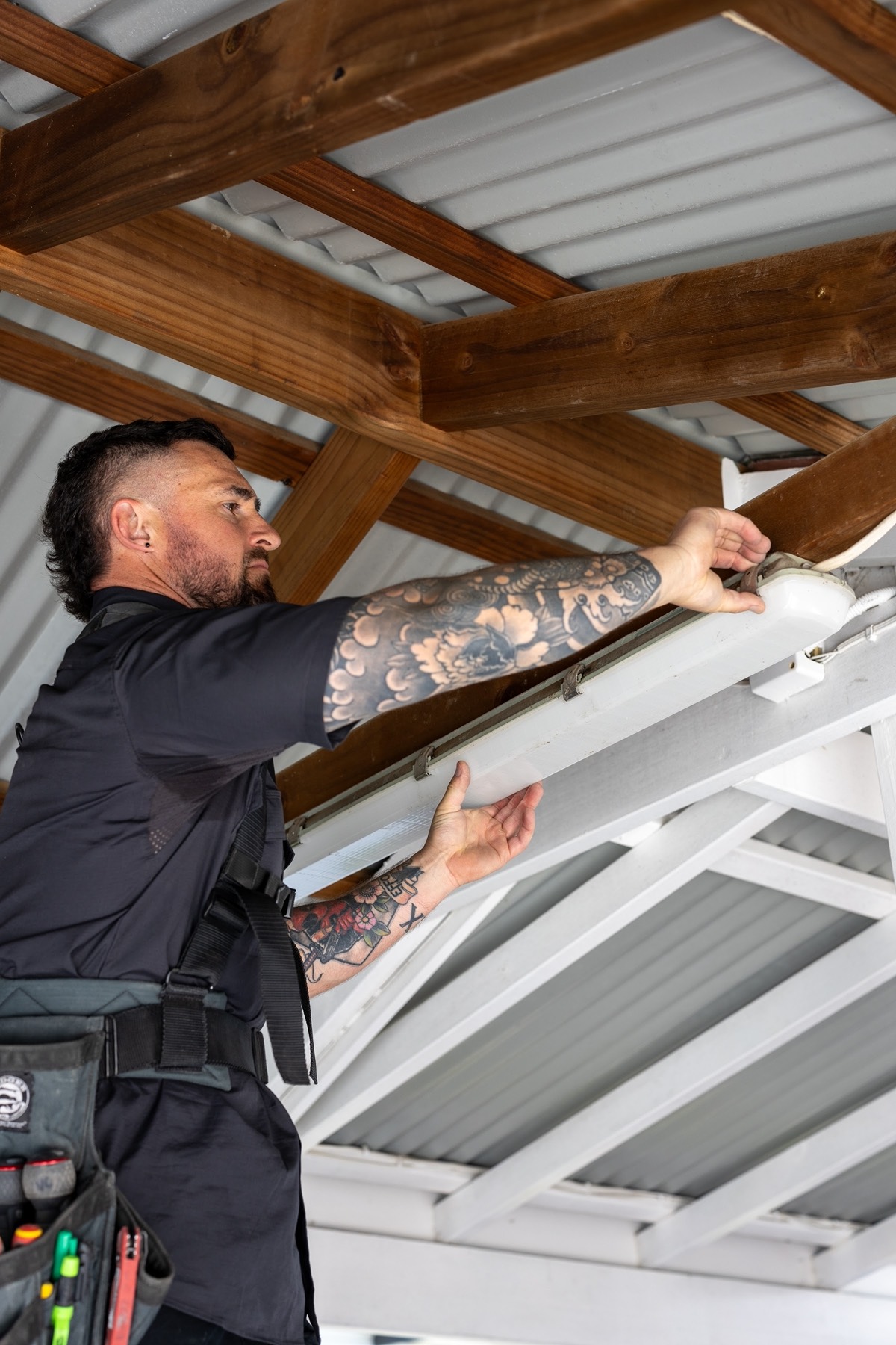 Fitting a new light under a pergola